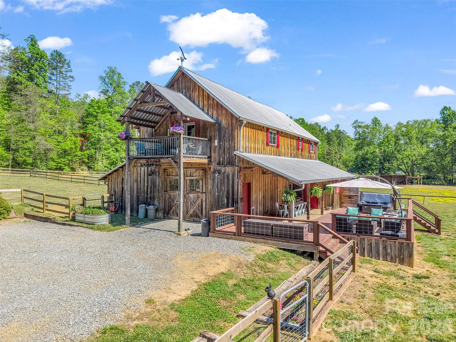 Authentic Barndominium on 35 Mountain Acres with Creek Frontage, Seven Pastures, and Long-Range Views Near Lake Lure