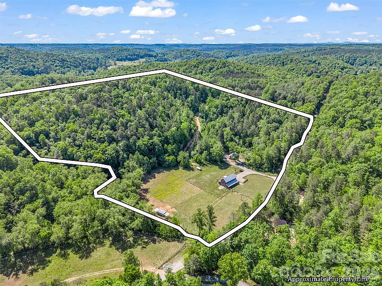 Authentic Barndominium on 35 Mountain Acres with Creek Frontage, Seven Pastures, and Long-Range Views Near Lake Lure