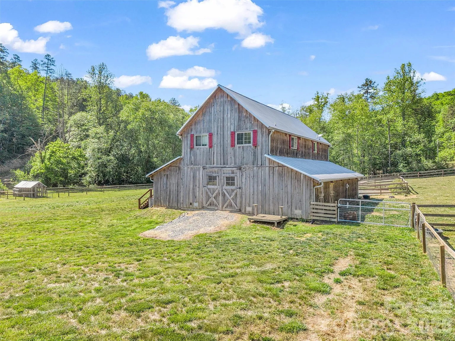 Authentic Barndominium on 35 Mountain Acres with Creek Frontage, Seven Pastures, and Long-Range Views Near Lake Lure
