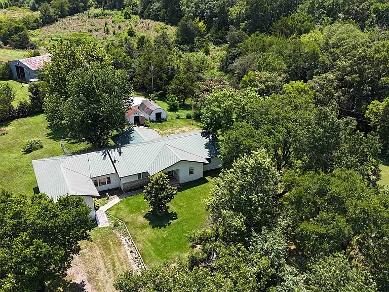 Board Camp Creek Frontage and Livestock Infrastructure on 8 Ouachita Acres Near Mena