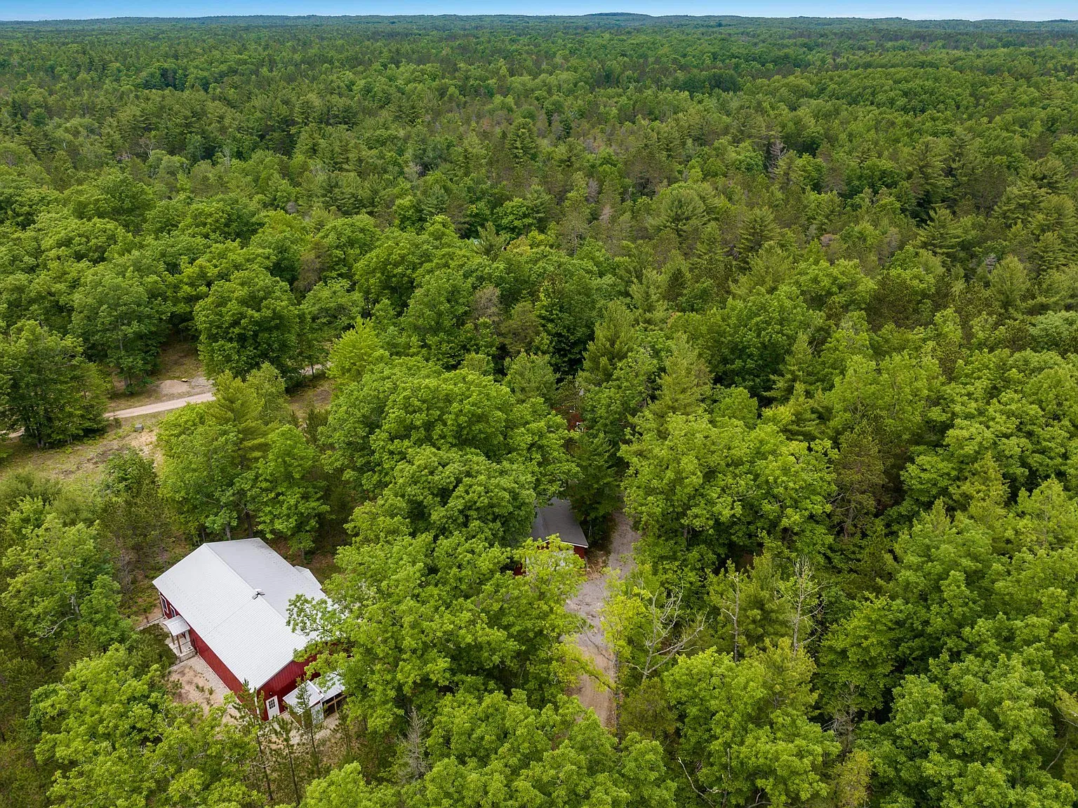 Cabin on 356 Feet of Blue Ribbon Trout Stream Frontage with Pole Barn on 10 Acres