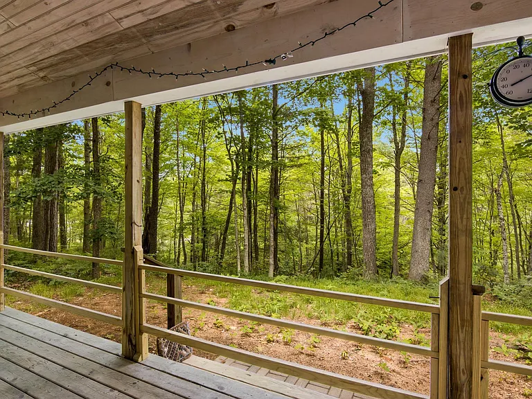 Cabin on 356 Feet of Blue Ribbon Trout Stream Frontage with Pole Barn on 10 Acres