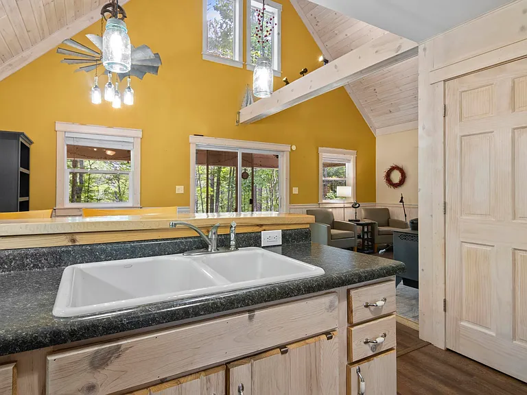 Cabin on 356 Feet of Blue Ribbon Trout Stream Frontage with Pole Barn on 10 Acres