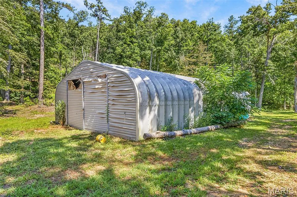 Two Log Cabins on Coldwater Creek, Ready to Reimagine