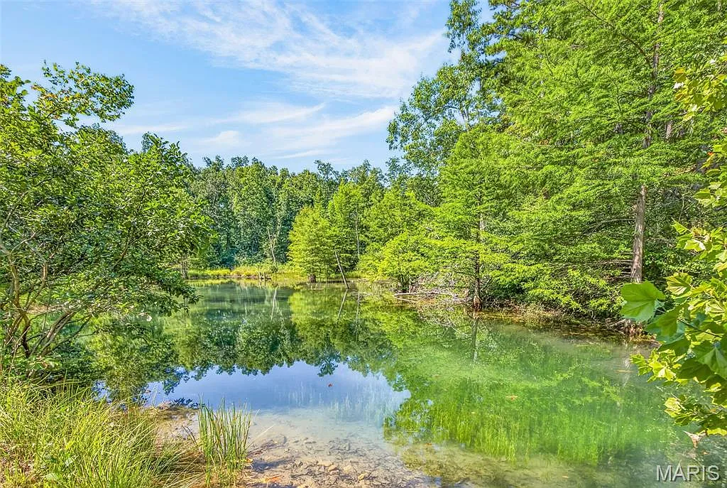 Two Log Cabins on Coldwater Creek, Ready to Reimagine