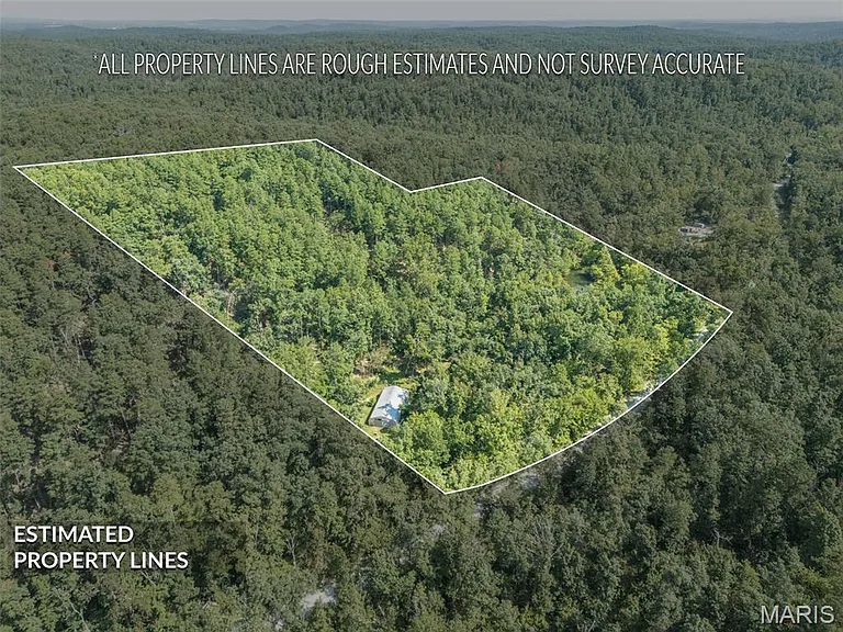 Two Log Cabins on Coldwater Creek, Ready to Reimagine