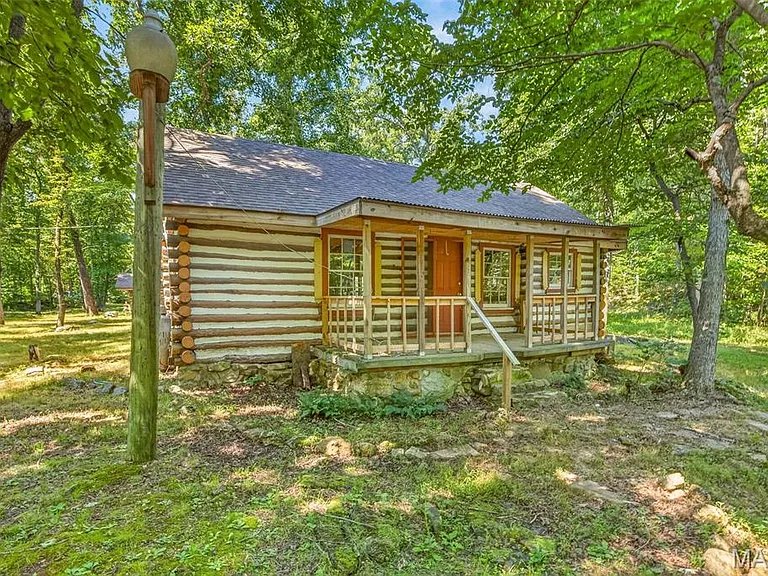Two Log Cabins on Coldwater Creek, Ready to Reimagine