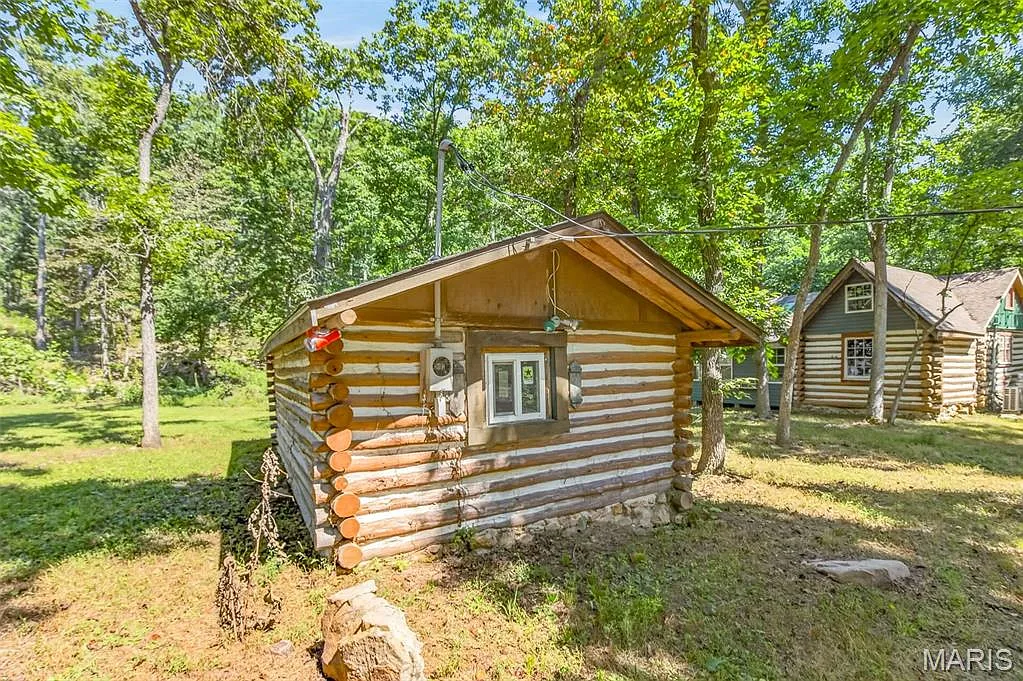 Two Log Cabins on Coldwater Creek, Ready to Reimagine