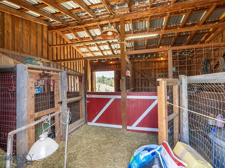 Nearly 10 Gallatin Valley Acres with Pond, Furnished Guest Cabin, Two-Stall Barn, and Six Powered Outbuildings Near Three Forks