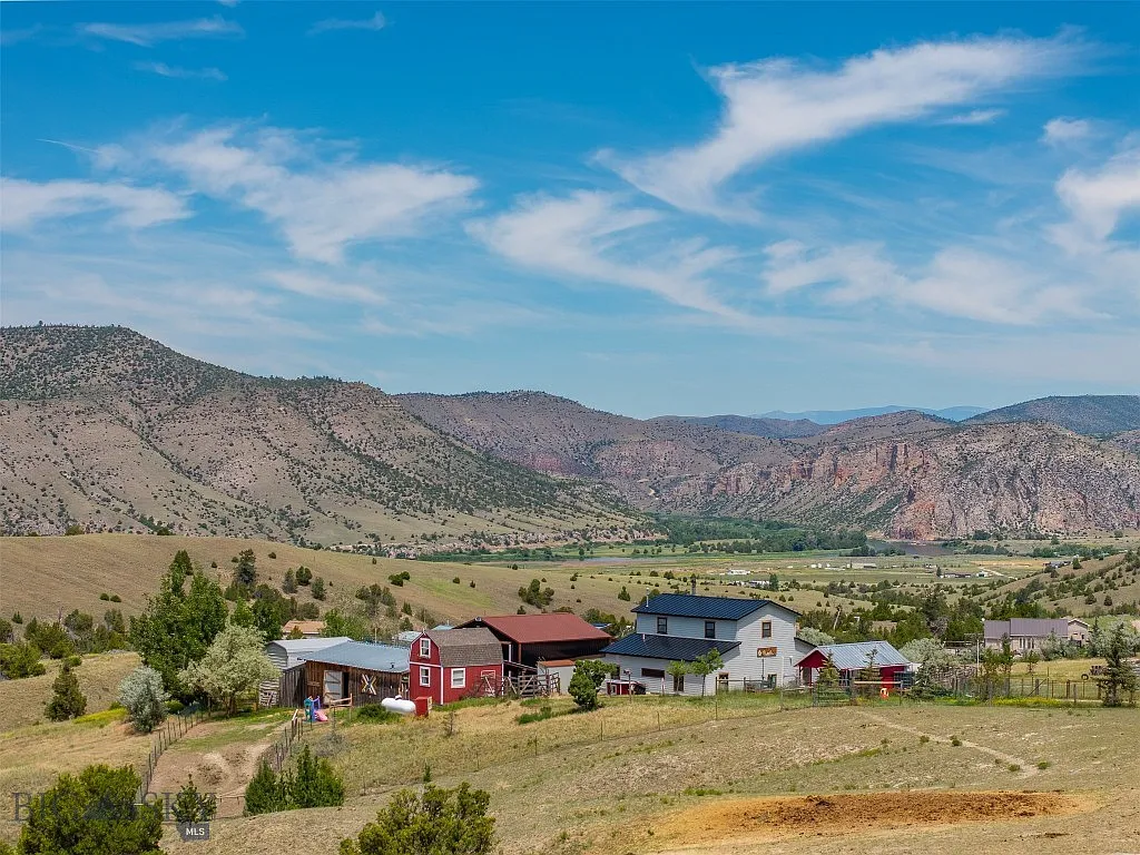 Nearly 10 Gallatin Valley Acres with Pond, Furnished Guest Cabin, Two-Stall Barn, and Six Powered Outbuildings Near Three Forks