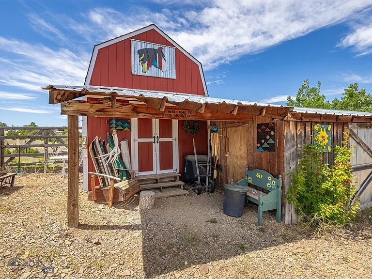 Nearly 10 Gallatin Valley Acres with Pond, Furnished Guest Cabin, Two-Stall Barn, and Six Powered Outbuildings Near Three Forks