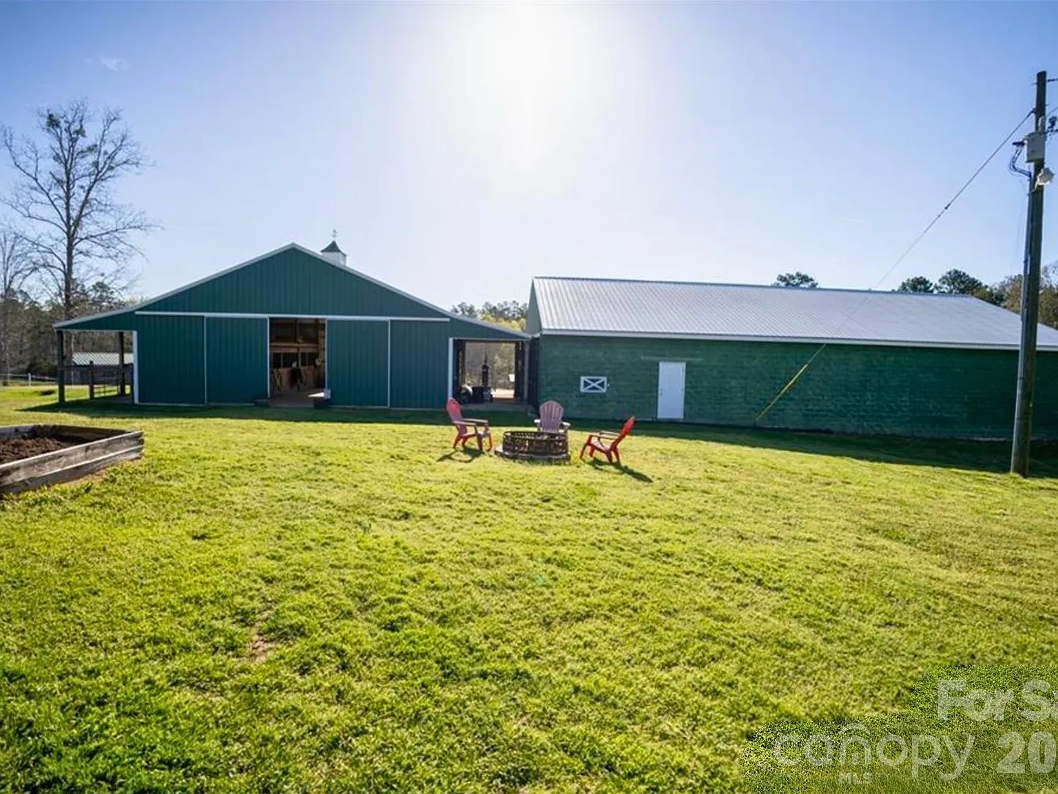 Horse Farm with 10-Stall Barn, Arena, and Five Paddocks on 12 Acres Near Lake Wylie