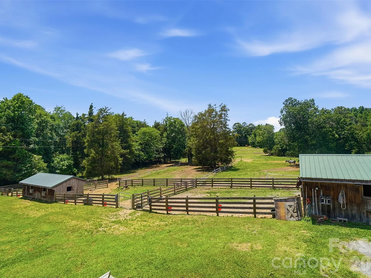 Horse Farm with 10-Stall Barn, Arena, and Five Paddocks on 12 Acres Near Lake Wylie