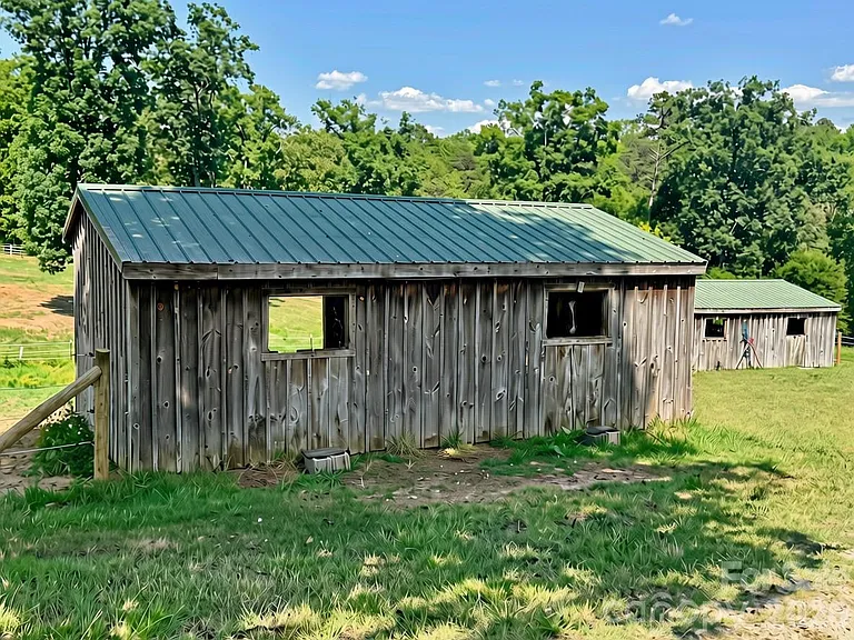 Horse Farm with 10-Stall Barn, Arena, and Five Paddocks on 12 Acres Near Lake Wylie