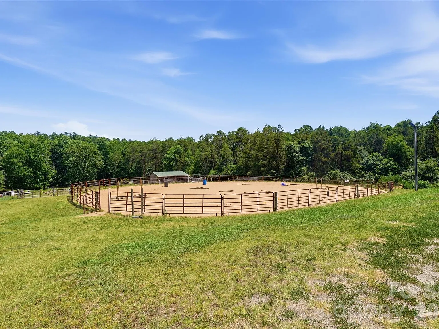 Horse Farm with 10-Stall Barn, Arena, and Five Paddocks on 12 Acres Near Lake Wylie