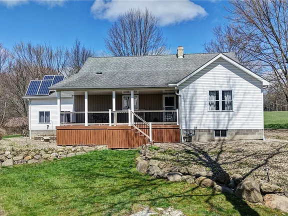 An Off-Grid Solar Home With a Barn and Shop on 7 Acres