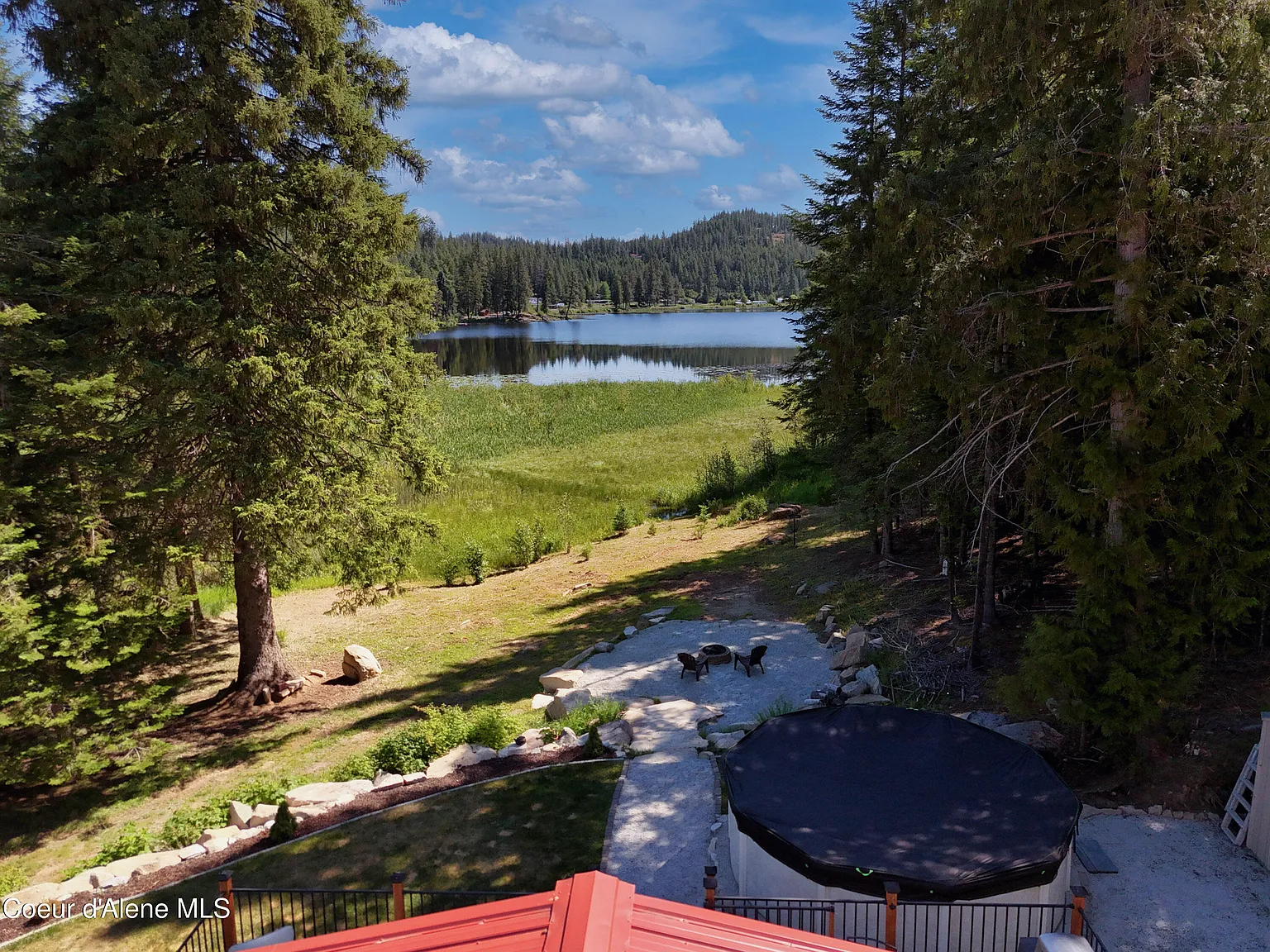 2020-Built Waterfront Retreat with 160 Feet of Private Kelso Lake Frontage, 5.5 Acres, and a 30x40 Shop Near Farragut State Park