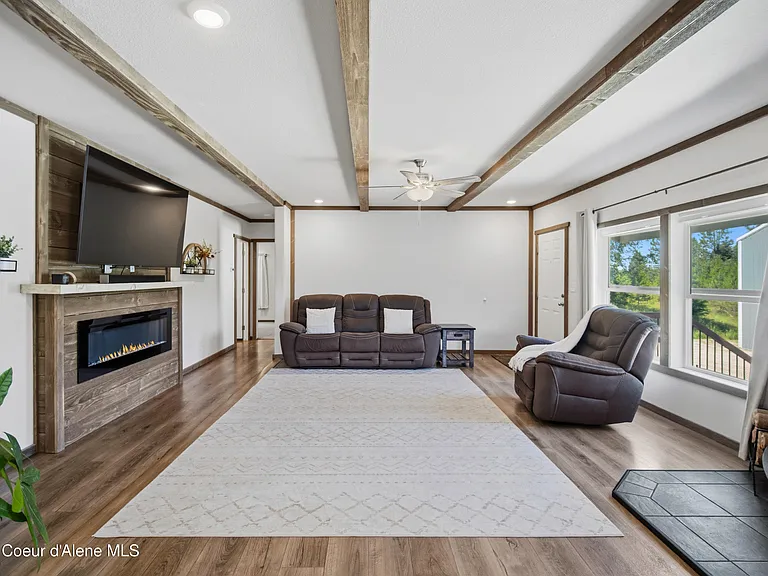 2020-Built Waterfront Retreat with 160 Feet of Private Kelso Lake Frontage, 5.5 Acres, and a 30x40 Shop Near Farragut State Park
