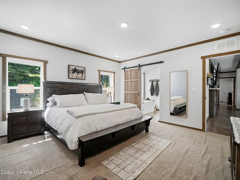 2020-Built Waterfront Retreat with 160 Feet of Private Kelso Lake Frontage, 5.5 Acres, and a 30x40 Shop Near Farragut State Park