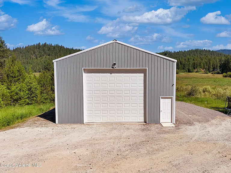 2020-Built Waterfront Retreat with 160 Feet of Private Kelso Lake Frontage, 5.5 Acres, and a 30x40 Shop Near Farragut State Park