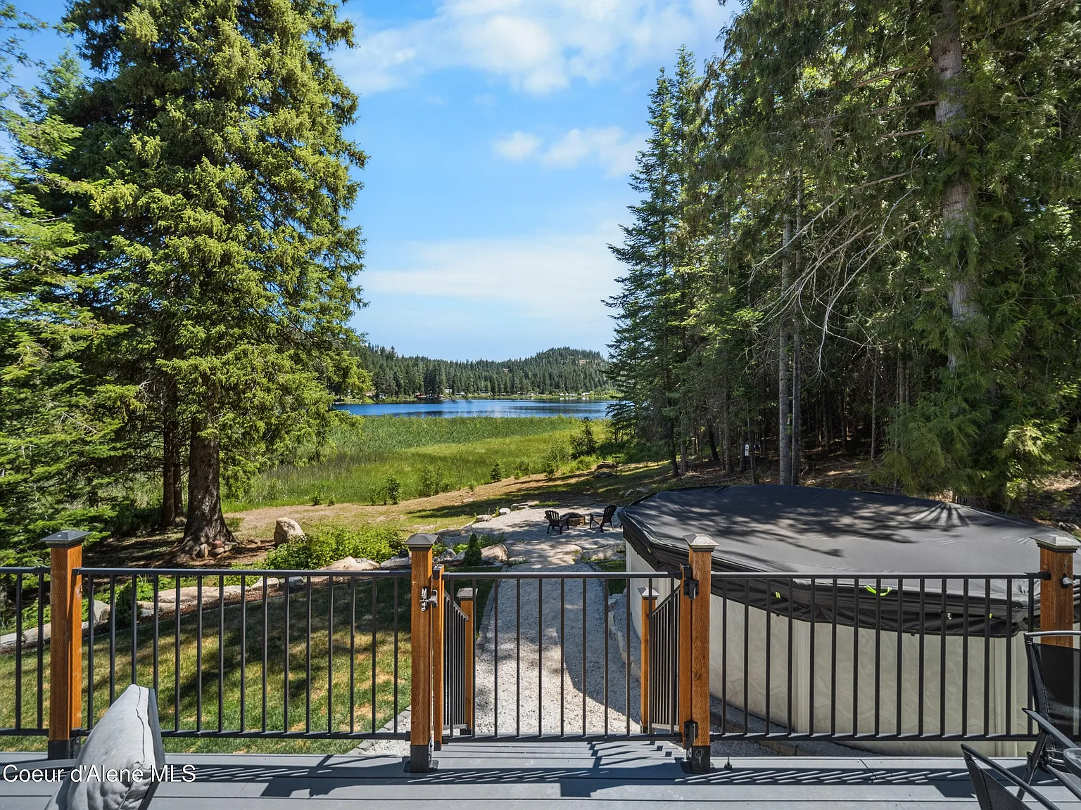 2020-Built Waterfront Retreat with 160 Feet of Private Kelso Lake Frontage, 5.5 Acres, and a 30x40 Shop Near Farragut State Park