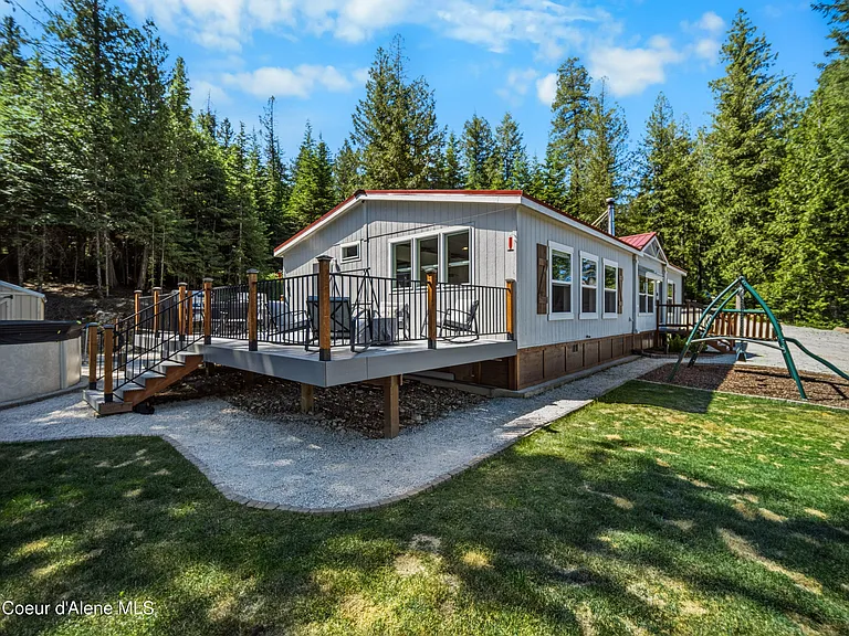 2020-Built Waterfront Retreat with 160 Feet of Private Kelso Lake Frontage, 5.5 Acres, and a 30x40 Shop Near Farragut State Park