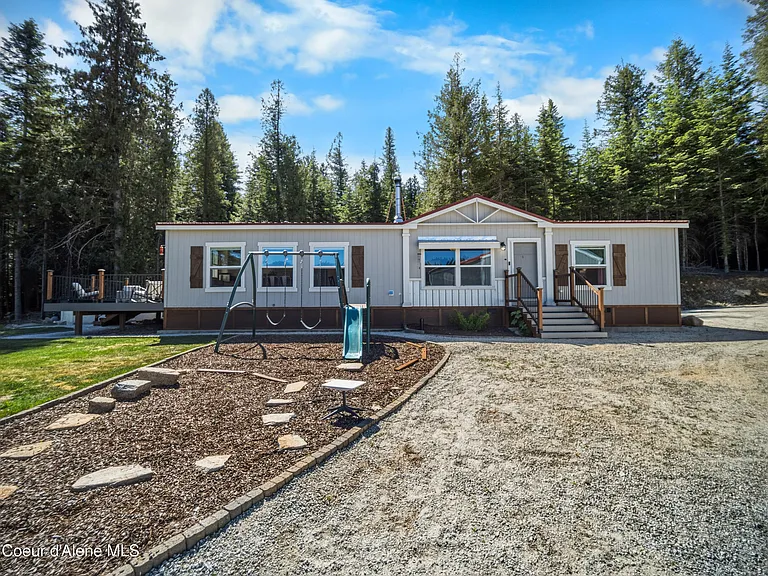 2020-Built Waterfront Retreat with 160 Feet of Private Kelso Lake Frontage, 5.5 Acres, and a 30x40 Shop Near Farragut State Park