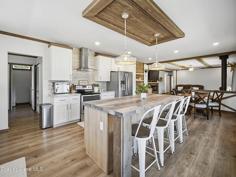 2020-Built Waterfront Retreat with 160 Feet of Private Kelso Lake Frontage, 5.5 Acres, and a 30x40 Shop Near Farragut State Park