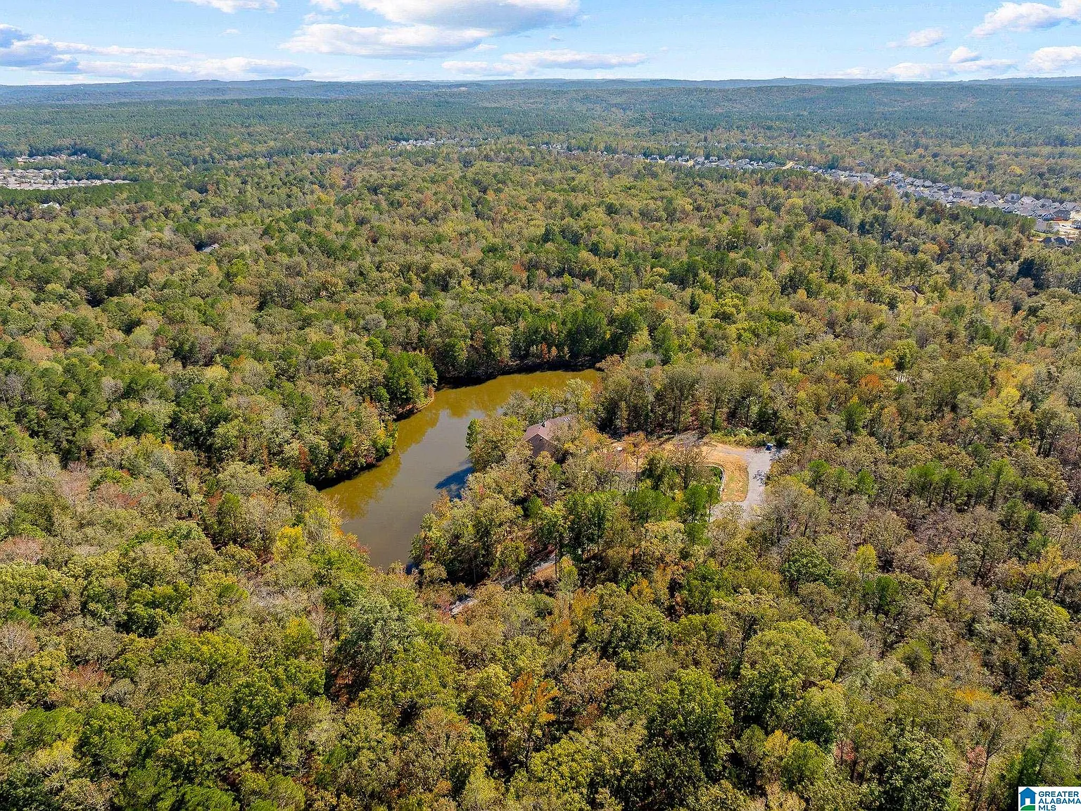A Lakeside Estate on 9 Acres, Ready to Reimagine From the Studs Up