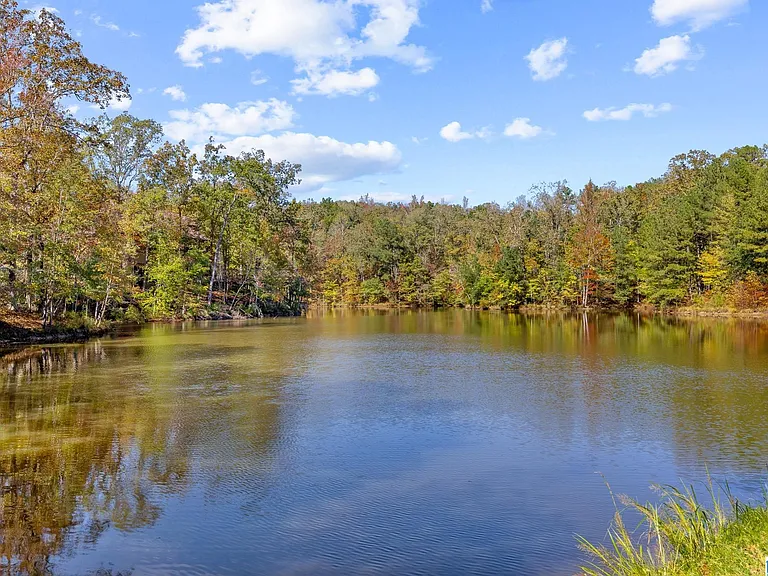 A Lakeside Estate on 9 Acres, Ready to Reimagine From the Studs Up