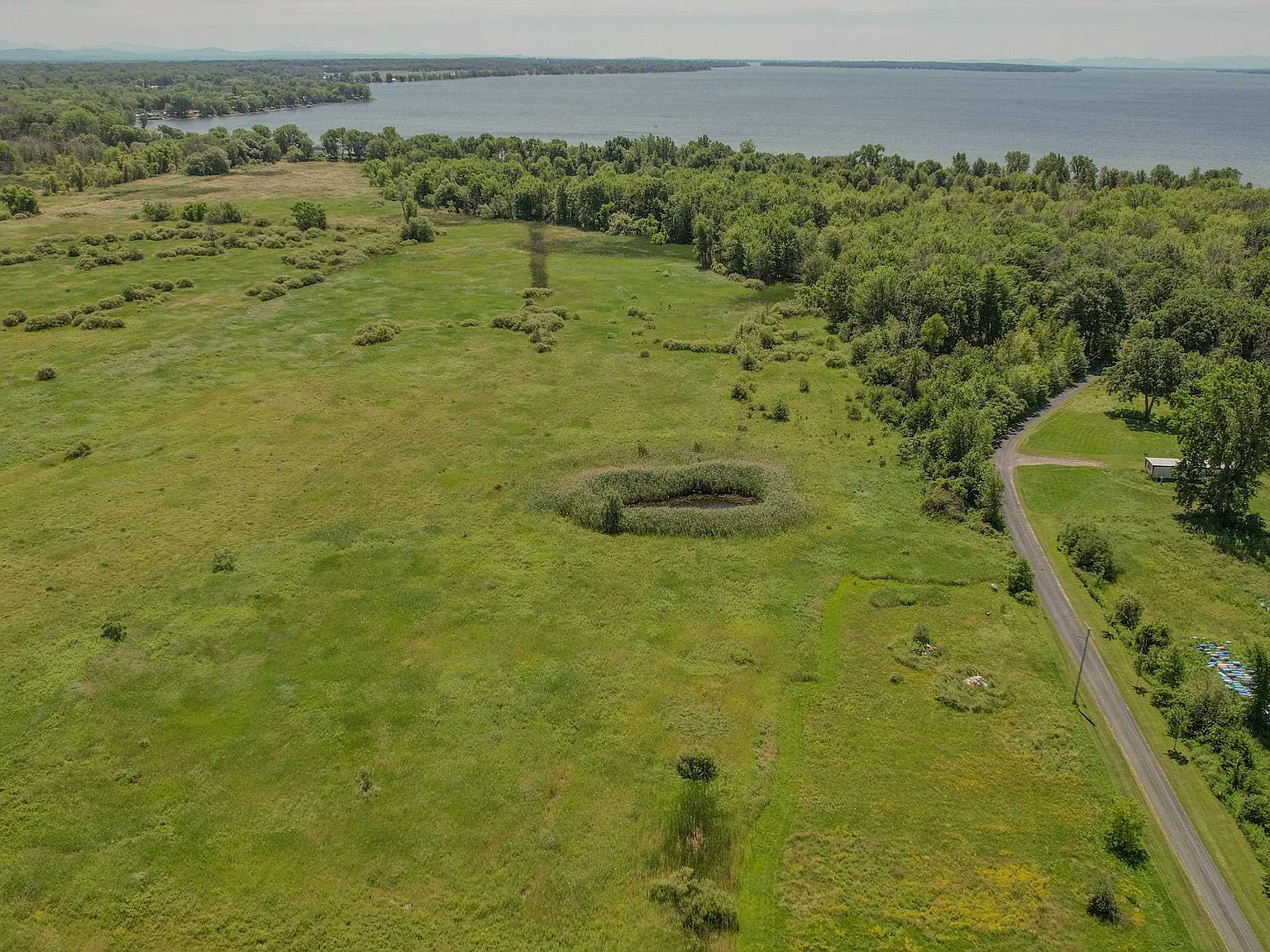 Direct Lake Champlain Frontage on 10 Private Acres