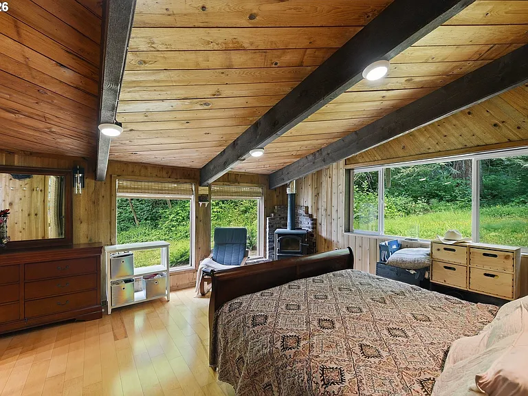 Lodge-Style Home with Salmon Stream on 22 Acres Bordering BLM and Elliott State Forest