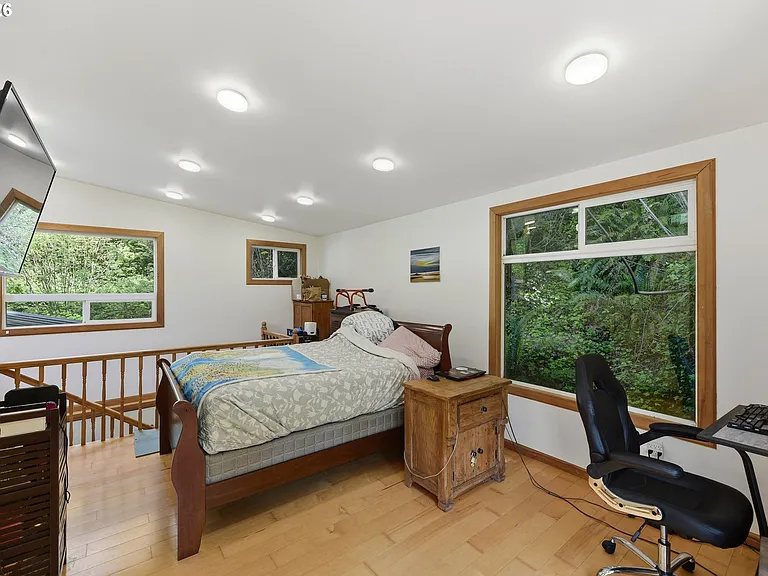 Lodge-Style Home with Salmon Stream on 22 Acres Bordering BLM and Elliott State Forest