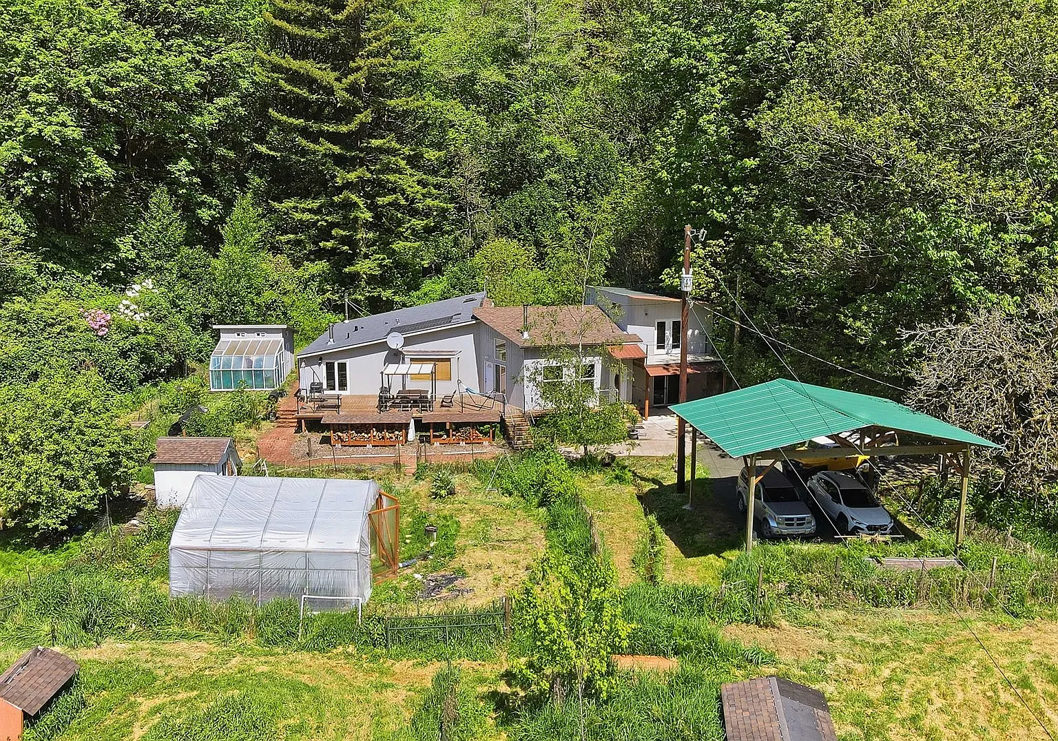 Lodge-Style Home with Salmon Stream on 22 Acres Bordering BLM and Elliott State Forest