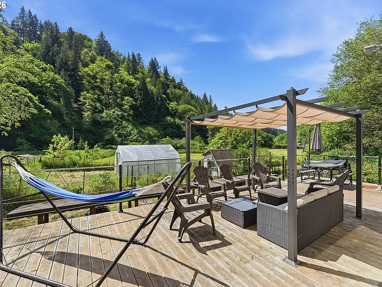 Lodge-Style Home with Salmon Stream on 22 Acres Bordering BLM and Elliott State Forest