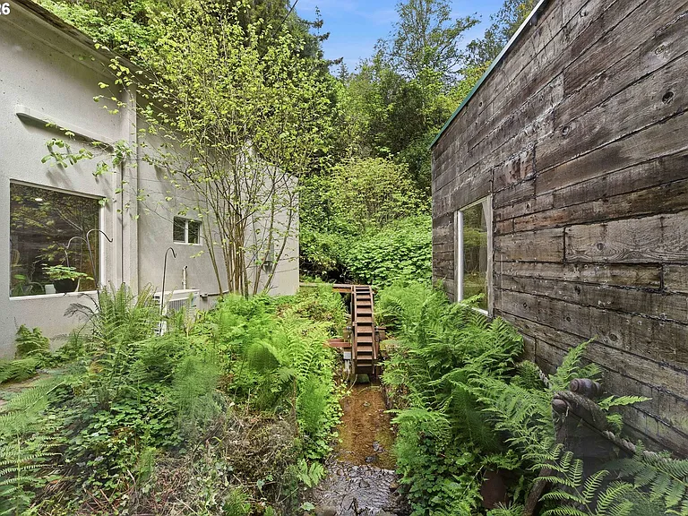 Lodge-Style Home with Salmon Stream on 22 Acres Bordering BLM and Elliott State Forest