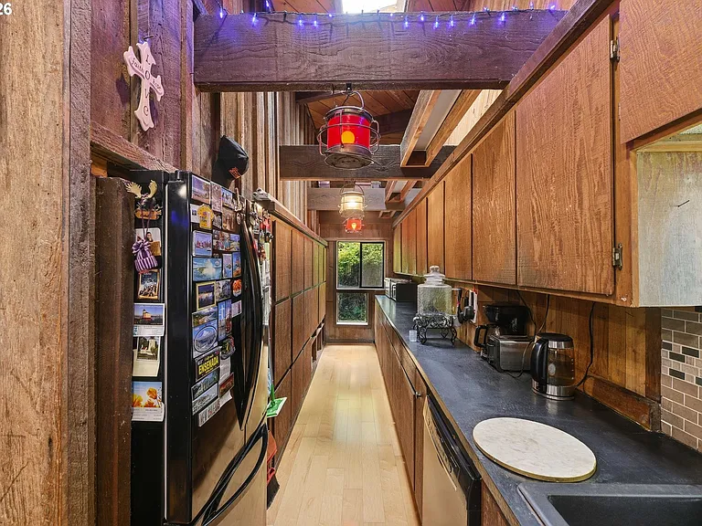 Lodge-Style Home with Salmon Stream on 22 Acres Bordering BLM and Elliott State Forest