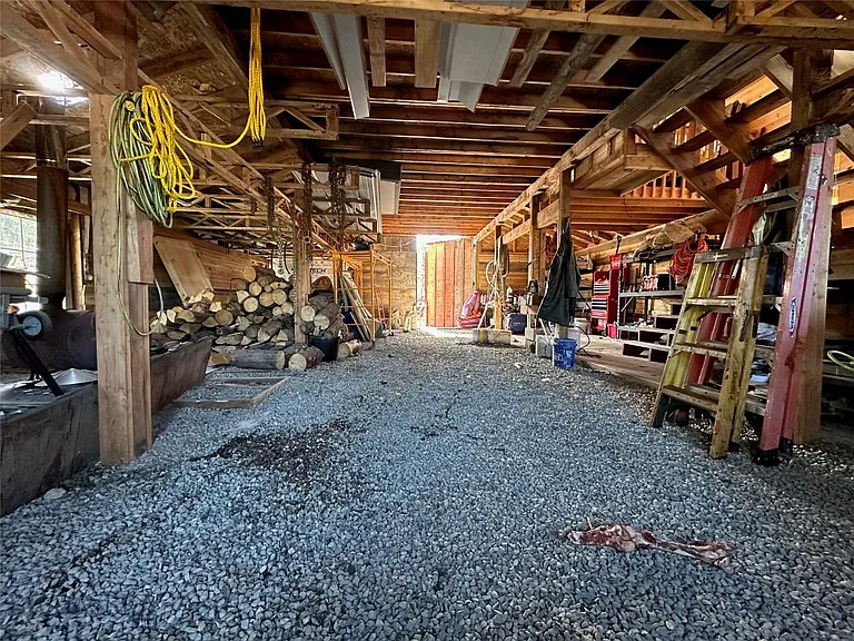 A Hand-Built Log Cabin, 31 Acres Past Where the Plow Stops