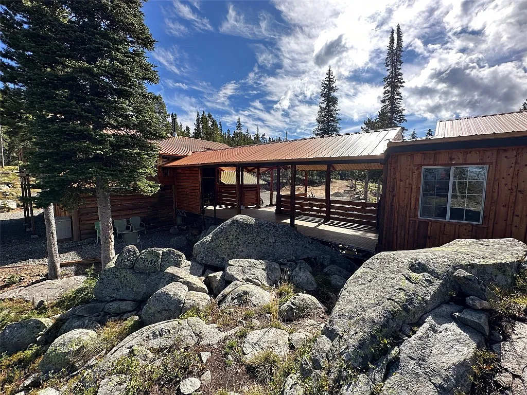 A Hand-Built Log Cabin, 31 Acres Past Where the Plow Stops