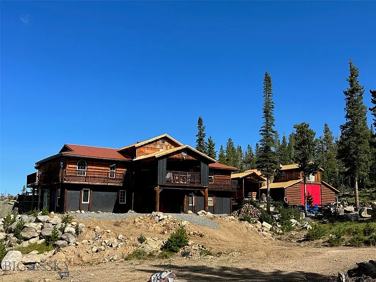 A Hand-Built Log Cabin, 31 Acres Past Where the Plow Stops