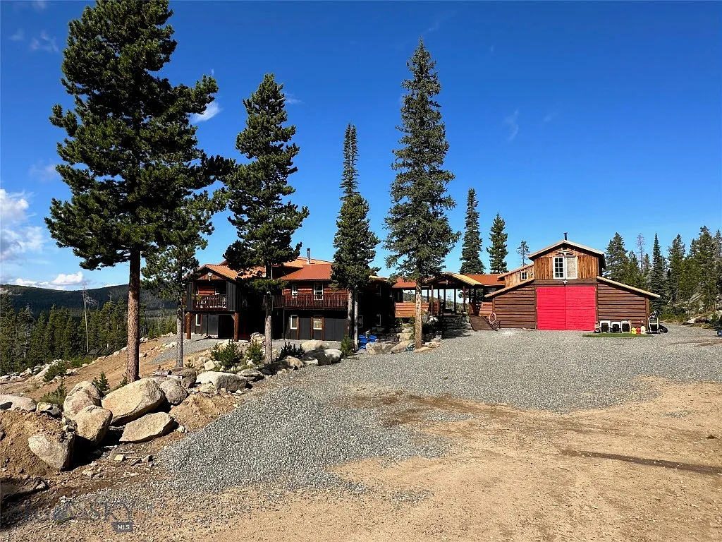 A Hand-Built Log Cabin, 31 Acres Past Where the Plow Stops