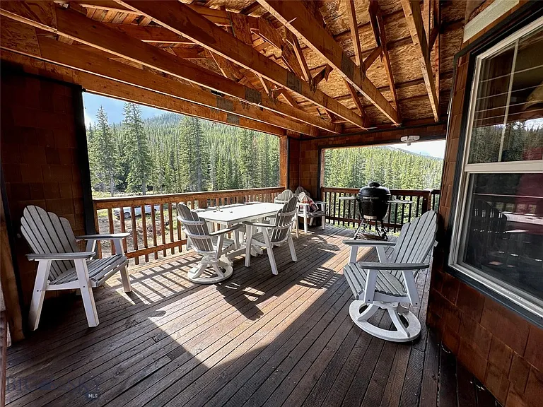 A Hand-Built Log Cabin, 31 Acres Past Where the Plow Stops