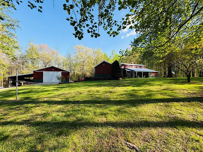 Morton Barndominium with 56 Wooded Acres, Stocked Pond, and Tractor Package Near Cape Girardeau