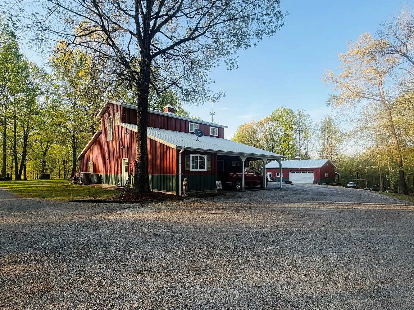 Morton Barndominium with 56 Wooded Acres, Stocked Pond, and Tractor Package Near Cape Girardeau
