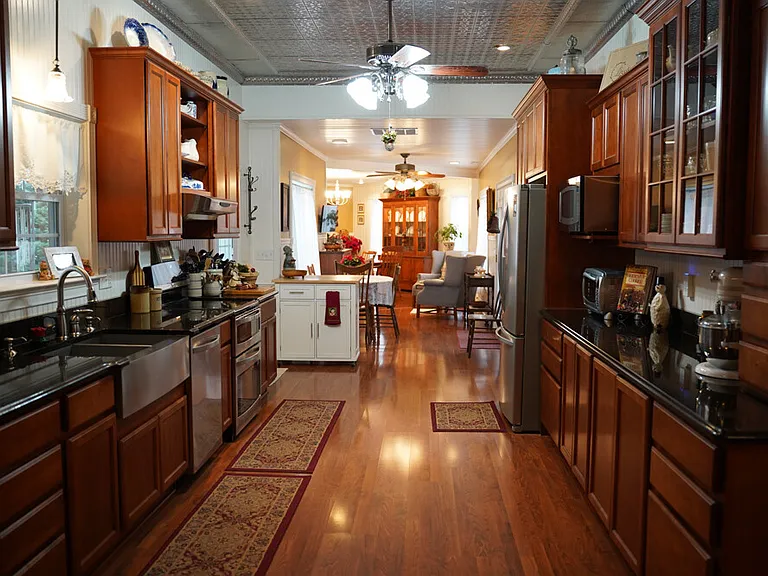 Morton Barndominium with 56 Wooded Acres, Stocked Pond, and Tractor Package Near Cape Girardeau