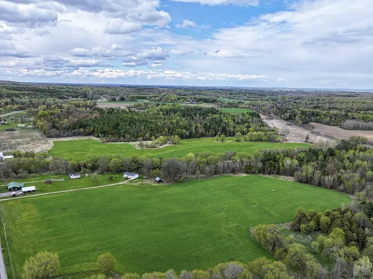 Four-Home Farm with Dairy Barn and Maple Sugar Shack on 168 Acres in West Chazy