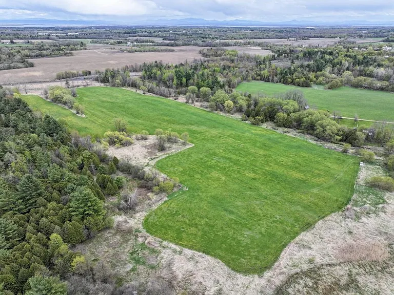 Four-Home Farm with Dairy Barn and Maple Sugar Shack on 168 Acres in West Chazy