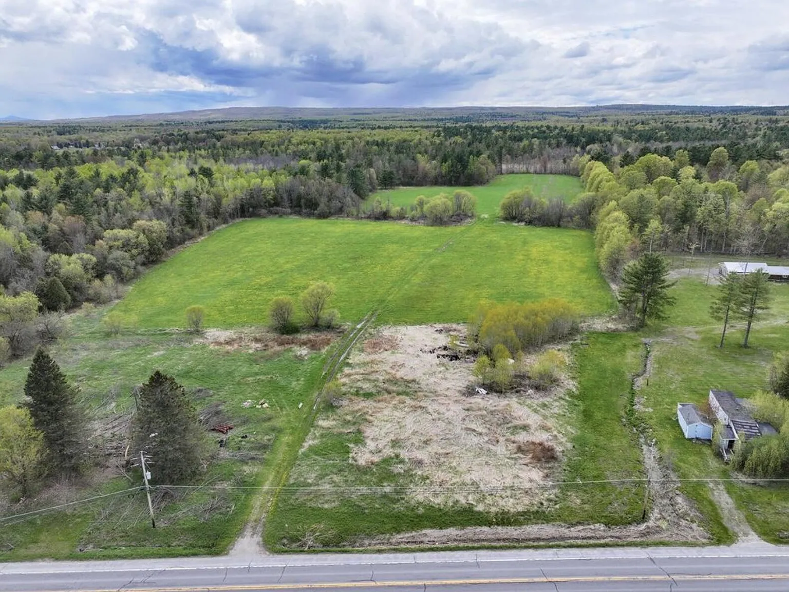 Four-Home Farm with Dairy Barn and Maple Sugar Shack on 168 Acres in West Chazy