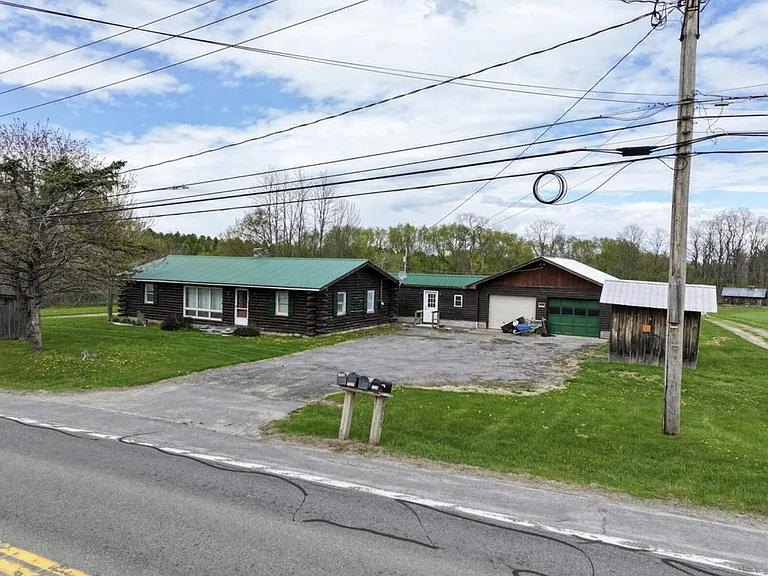 Four-Home Farm with Dairy Barn and Maple Sugar Shack on 168 Acres in West Chazy