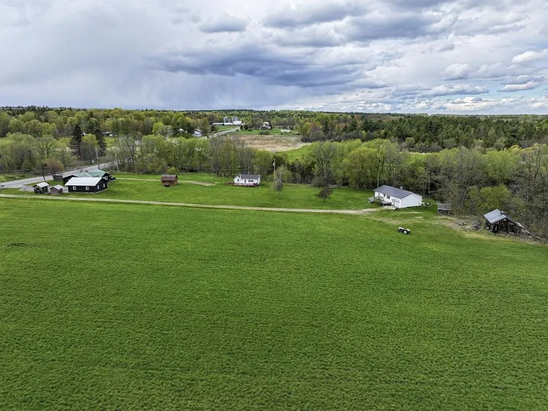 Four-Home Farm with Dairy Barn and Maple Sugar Shack on 168 Acres in West Chazy